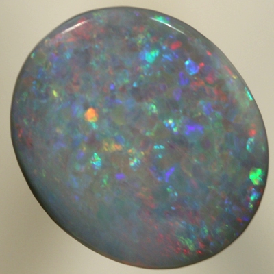 SOLID SEMI BLACK OPAL Sparkles of red over blue with a touch of green
